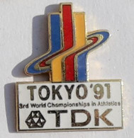 A103 Pin's JAPON JAPAN TELEVISION TDK TOKYO 91 Athlétisme World Championships In Athletics Qualité Egf  Achat Immédiat - Médias