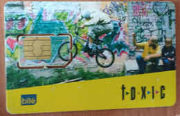 Latvia- BOY WITH BMX BIKE -TOXIC-  Bite GSM WITH CHIP CARD USED  - A Graffiti Artist - Latvia