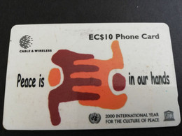 ST LUCIA    $ 10  CABLE & WIRELESS   PEACE IN OUR HANDS   338CSLB   Fine Used Card ** 5305** - St. Lucia