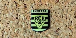 Pin's RUGBY RCE ENNEZAT (63) - Verni époxy - Fabricant ARKOS - Rugby