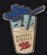 70995- Pin's.S.l.l. Candia. Marseille.Lait. - Boissons