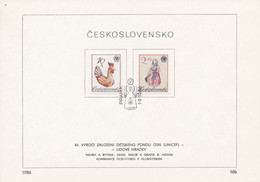 Czechoslovakia / First Day Sheet (1986/16b) Praha: 40th Anniv. Children's Fund UNICEF (Folk Toys); Painter: B. Housa - Dolls