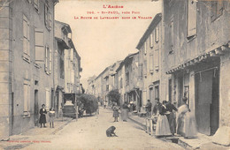 CPA 09 SAINT PAUL PRES FOIX LA ROUTE DE LAVELANET DANS LE VILLAGE - Autres & Non Classés