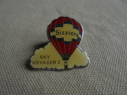 Vintage - PIN'S Publicitaire Montgolfière Sizzier Sky Voyager 1 - Luchtballons