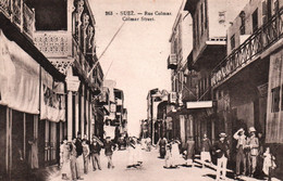 Suez - Rue Colmar, Commerces - Carte N° 263 Non Circulée - Sues