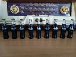 9 Mini Bouteilles Coca Cola Années 70 - Botellas