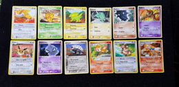 Carte Lot D 12 POKEMON Balbuto Dynavolt Apitrini Kangourex Ouisticram Chimpenfeu Evoli Tauros Galegon Polichombr Ymphect - Lots & Collections