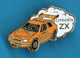 PIN'S //   . CITROËN ZX / RALLYE PARIS - DAKAR / MICHELIN / CAMEL ** - Rallye