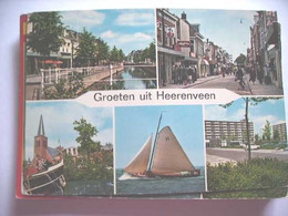 Nederland Holland Pays Bas Heerenveen Met Winkelstraat En Skutsje - Heerenveen