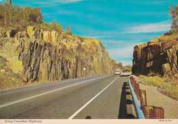 A11496- TOURING CANADA, THE STARK GRANDEUR OF A ROCK DEFILE, BROOKS ALBERTA CANADA VINTAGE AUTO  POSTCARD - Otros & Sin Clasificación