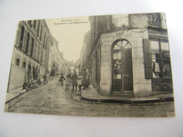 CPA - Exmes (61) -Rue Neuve - La Gendarmerie - Mercerie Digeon - 1910 - SUP  (FI 36) - Exmes