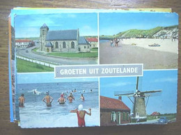 Nederland Holland Pays Bas Zoutelande Met Kerk, Molen En Zee - Zoutelande