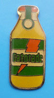 Pin's - Gatorade - Boisson énergétique - Un Eclair Sur Une Bouteille - Origine USA - Boissons