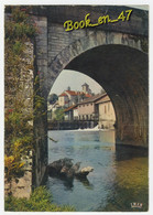 {61001} 64 Pyrénées Atlantiques Saint Palais , L' église Et Le Pont Sur La Bidouze - Saint Palais