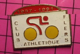 411b Pin's Pins / Beau Et Rare / THEME : SPORTS / CYCLISME CLUB ATHLETIQUE FLERS ORNE 1957 1991 - Cyclisme