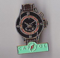 PIN'S  THEME SPORT RALLYE PARIS DAKAR  PARIS LE CAP  MONTRE CHRONOMETRE CAPITOL - Rally