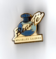 Pin's Nouvelles Galeries Beauté - Parfums