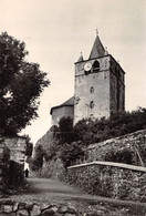 CPSM 12 LAGUIOLE LE CHEMIN DU FORT ET L'EGLISE - Laguiole