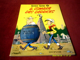 LUCKY LUKE  N° 18  A L'OMBRE  DERS DERRICKS - Lucky Luke