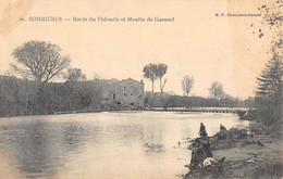 CPA 30 SOMMIERES BORDS DU VIDOURLE ET MOULIN DE GARANEL - Sommières