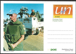 Eire Ireland Postal Stationery Postage Paid Exhibition Card 1995 UN Soldier Uniform Weapon Truck Loggo Globe Peace Equal - Interi Postali