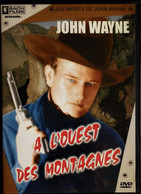 A L'Ouest Des Montagnes - John Wayne . - Western / Cowboy