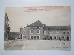 LIFFOL LE GRAND  LA RUE DE LA CORVEE ET LES CAFES (abimée) - Liffol Le Grand