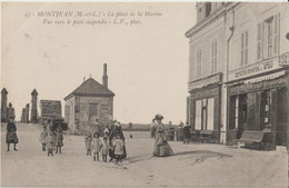 MONTJEAN  ( M. Et L. ) - La Place De La Marine. Vue Vers Le Pont Suspendu. Café De La Marine. Personnages.Carte Animée.. - Autres Communes