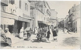 Algérie - MASCARA - LA RUE D'ORAN - Attelage D'âne Vu De Face -Magasins - Quincaillerie R.RUIZ  N° 57  L.L.éditeur  1915 - Autres & Non Classés