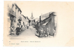 Algérie - REMOULEUR - AIGUISEUR Au SOUK AHRAS Rue De Madaure -  N° 23 éditeur J.GEISER Alger   Carte Pionnière - Street Merchants