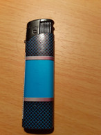 BRIQUET TABAC PRESSE NOIR ET TURQUOISE - Autres & Non Classés