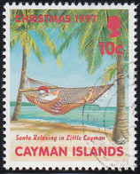 Cayman Islands 1997 Used Sc #749 10c Santa In Hammock Christmas - Cayman Islands