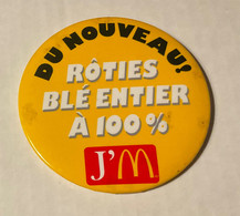 PIN’S, BADGE, ÉPINGLETTE, MACARON - McDONALD’S - DU NOUVEAU - RÔTIES BLÉ ENTIER À 100%. - J’M - - McDonald's