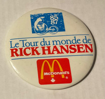 PIN’S, BADGE, ÉPINGLETTE, MACARON - McDONALD’S - LE TOUR DU MONDE 1985-87 DE RICK HANSEN. - - McDonald's
