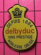 710G Pin's Pins / Beau Et Rare / THEME : BOISSONS / DELBYDUC VINS PRESTIGE NOBLESSE OBLIGE DEPUIS 1884 - Boissons