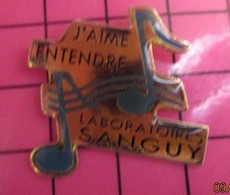 413f Pin's Pins : BEAU ET RARE / THEME : MEDICAL / SOURD SURDITE J'AIME ENTENDRE LABORATOIRE SANGUY Et Saverdure ? - Médical