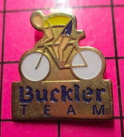 313H Pin's Pins / Beau Et Rare / THEME : SPORTS / CYCLISME MAILLOT JAUNE BUCKLER TEAM BIERE SANS ALCOOL - Judo