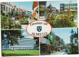 Groeten Uit Almelo - (Overijssel, Nederland / Holland) O.a. 'Sporthuis' Neon, Winkels, Flat - Nr. L 3993 - Almelo