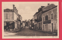 32 - RISCLE---Rue De Lebrére--Magasin La Ruche Meridionale---animé---cpsm Pf - Riscle