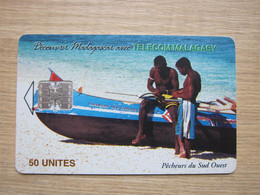 Chip Phonecard, Men,boat On Beach,used - Madagaskar