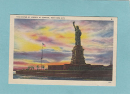 NEW  YORK  CITY  -  THE  STATUE  OF  LIBERTY  AT  SUNRISE    - - Statue Of Liberty