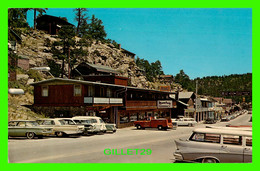 EVERGREEN, CO - BUSINESS DISTRICT - ANIMATED WITH OLD CARS - PUB. BY COOPER POST CARD CO - - Other