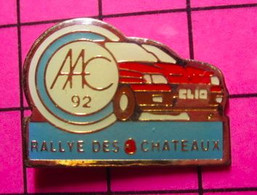 422 Pin's Pins / Beau Et Rare / THEME : AUTOMOBILES / RALLYE DES 3 CHATEAUX AAC O2 CLIO ROUGE - Rallye