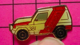 822 Pin's Pins / Beau Et Rare / THEME AUTOMOBILES / VOITURE DE RALLYE 4x4 MADA N°381 - Rallye