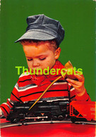 Delcampe - CPSM JEUNE GARCON CHEMIN DE FER TRAIN JEU JOUET YOUNG BOY WITH TOY TOYS TRAIN TRACK - Spielzeug & Spiele