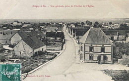 Origny Le Sec - Vue Générale Du Village Prise Du Clocher De L’église - La Route - Autres & Non Classés