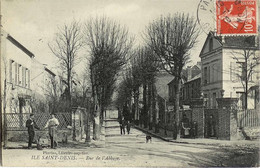 L'Ile Saint Denis, Rue De L'Abbaye. CPA Animée. Circulée, Timbrée. Parfait état - L'Ile Saint Denis