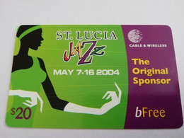 ST LUCIA    $ 20,-PAY AS YOU GO  JAZZ FESTIVAL Green/PURPLE BFREE  Prepaid    Fine Used Card  ** 8755** - St. Lucia