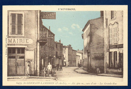 63. Saint-Germain Lembron. La Grande Rue. Mairie. Coiffeur Marcel. Auto-location. Café Etienne - Saint Germain Lembron
