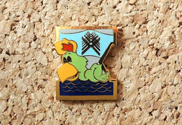 Pin's OISEAU PERROQUET - AMIGO 1987 Indianapolis USOC Officiel Jeux Panaméricains - émail - Zwemmen